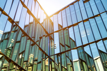 Abstract architectural facade with a repeating diamond pattern.